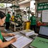 Tại sao nhiều hợp tác xã mua máy hiện đại nhưng vẫn phải thuê người ghi sổ bằng tay?